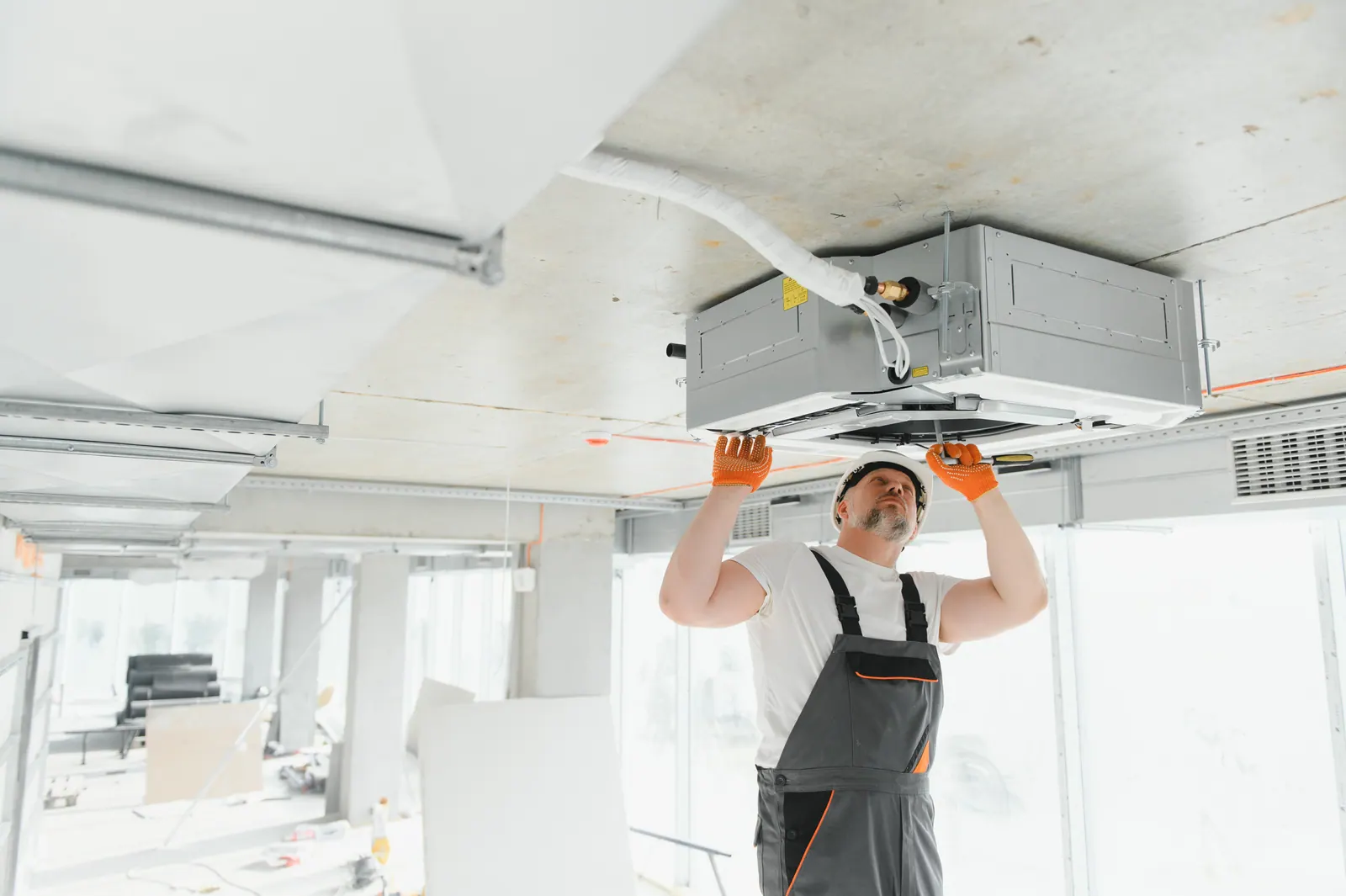 Commercial rooftop HVAC installation team at work